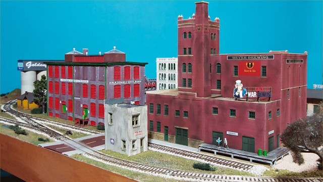 The tall buildings separate this switching area from the rest of the layout.