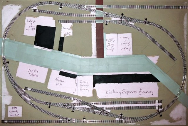 Track and building placement was drawn on the layout base as a guide.