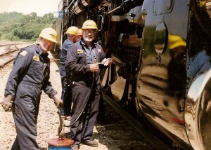 Two guys and a grease gun - the main rods and side rods were greased at each service stop.