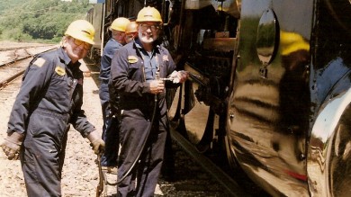 Two guys and a grease gun - the main rods and side rods were greased at each service stop.