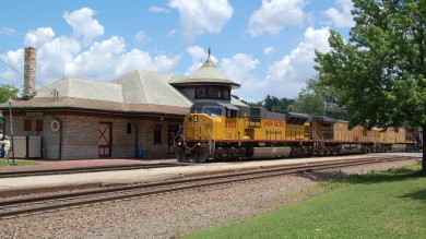 This is UP SD 80 MAC #8066, on the point of an empty coal train westbound at the historic Kirkwood Station and headed back to the Wyoming coal fields.