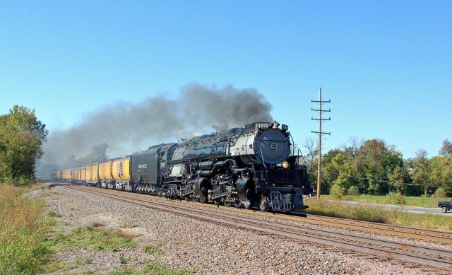 Union Pacific's Challenger #3895 is under full power east bound at Dozier Crossing just east of Pacific, MO. Next stop: briefly at Kirkwood Station and then downtown St. Louis.