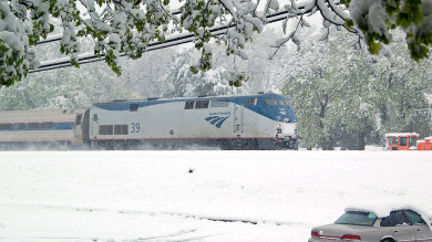 Monday morning, we awoke to a snowstorm ... on April 23rd! Amtrak's Pennsylvanian headed east.