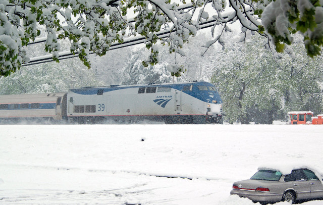 Monday morning, we awoke to a snowstorm ... on April 23rd! Amtrak's Pennsylvanian headed east.