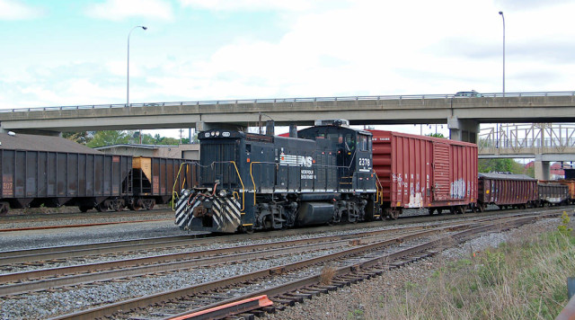 Switching beside the coal empties leaving town.