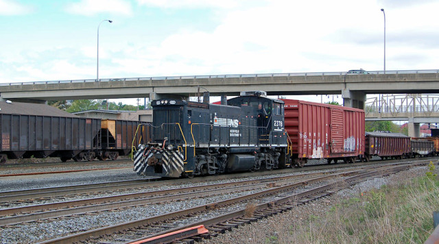 Switching beside the coal empties leaving town.