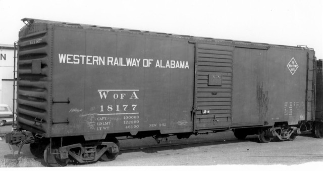 Western Railway of Alabama 18177 at San Francisco, December 1953. It didn't take long for black car cement to begin peeling from the roof sheets. Note that the roof cement coating is already deteriorating off this car’s roof after just 21 months. Many cars lost virtually all of the roof cement coating after three or four years, leaving the black coating over the seam caps, which tended to adhere much better than to the galvanized steel roof panels. Photo by W.C. Whittaker, Ed Hawkins collection.