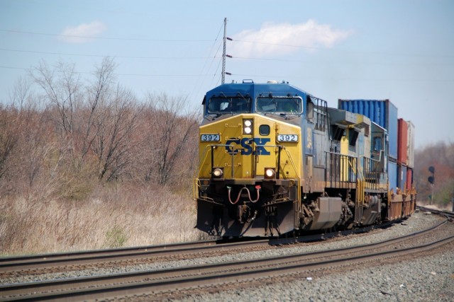 We saw lots of foreign power. Here, CSX is on the point of this stack train; we're behind the Portage Rail Museum.