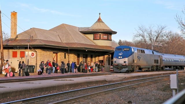 Amtrak's westbound Missouri River Runner calls at historic and busy Kirkwood Station.