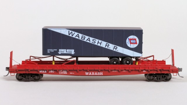 Side view of Wabash flat car and trailer.