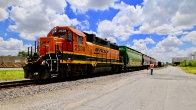 This BNSF GP38-2 is switching the Pinnacle Foods, Inc. plant in the background. A larger railroad yard, located in an industrial park, is beyond the plant, which manufactures cake mix for Duncan Hines.