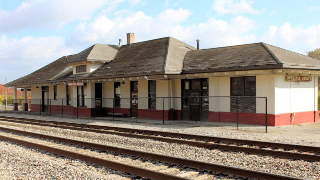 Thanks to the local business district commission paying for the latest painting, this is how the depot now looks. The club paid for the new fence last fall that replaced the aging and damaged fence (from someone driving into it).