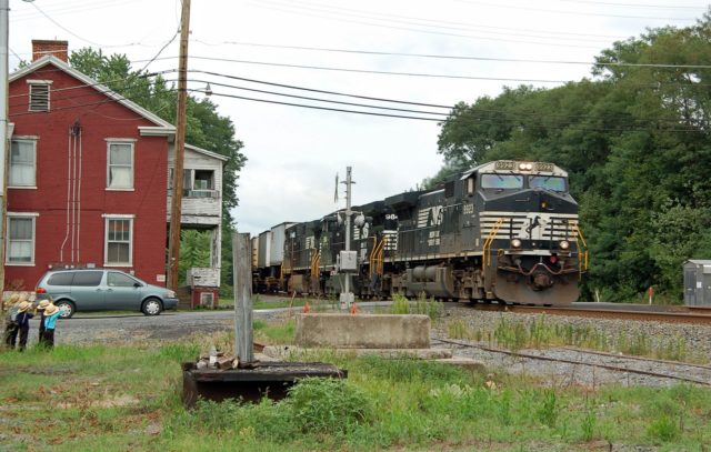 Westbound freight at Mattawana, Pennsylvania. Note the young children in the middle of the photo at the far left. I missed the better shot on the previous passing train when they were closer to the track, but when mom saw me raise the camera, made them move back.