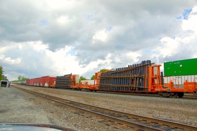 Role reversal: the prototype takes a page from the modeler handbook with these prefab turnouts being delivered to a distant location.